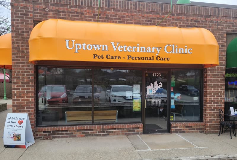 The exterior of Uptown Veterinary Clinic with its orange awning in Ann Arbor, Michigan